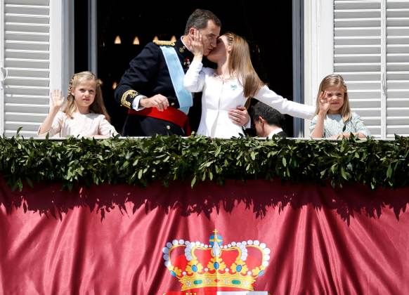 Spain's new King Felipe VI his wife Queen Letizia Princess Sofia and Princess Leonor appear on the balcony of the Royal Palace in Madrid