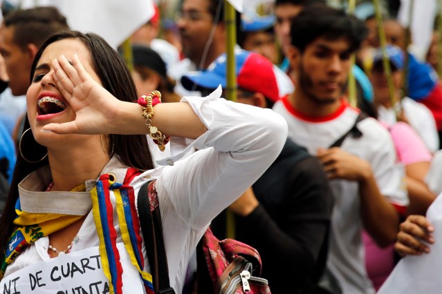 Opposition students march against Venezuelan President Maduro's government in Caracas
