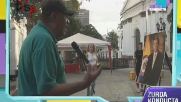 VTV se copia de Colombia y pone foto de Santos a escuchar críticas de los caraqueños (VIDEO)