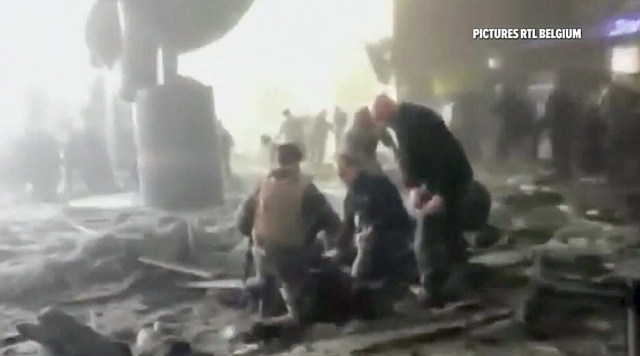 ATTENTION EDITORS - VISUAL COVERAGE OF SCENES OF INJURY OR DEATH Rescue workers treat victims at the airport, in this image taken from television video, after a blast in Brussels, Belgium, March 22, 2016.  REUTERS/RTL Belgium via Reuters TV   ATTENTION EDITORS - THIS IMAGE HAS BEEN SUPPLIED BY A THIRD PARTY. FOR EDITORIAL USE ONLY. NOT FOR SALE FOR MARKETING OR ADVERTISING CAMPAIGNS. FOR EDITORIAL USE ONLY. NO RESALES. NO ARCHIVE. BELGIUM OUT. NO COMMERCIAL OR EDITORIAL SALES IN BELGIUM. THIS PICTURE IS DISTRIBUTED EXACTLY AS RECEIVED BY REUTERS, AS A SERVICE TO CLIENTS. TEMPLATE OUT