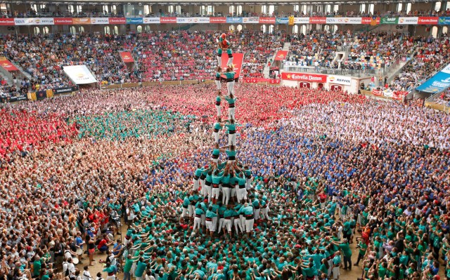 FILE PHOTO - Castellers de Vilafranca form a human tower called 'castell' during a biannual competition in Tarragona city, Spain October 2, 2016. REUTERS/Albert Gea/File Photo REUTERS PICTURES OF THE YEAR 2016 - SEARCH 'POY 2016' TO FIND ALL IMAGES