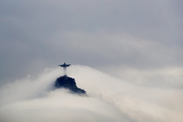 FILE PHOTO -  Clouds surround the Christ the Redeemer statue over Rio de Janeiro, Brazil, August 9, 2016.  REUTERS/Brian Snyder/File Photo                     REUTERS PICTURES OF THE YEAR 2016 - SEARCH 'POY 2016' TO FIND ALL IMAGES