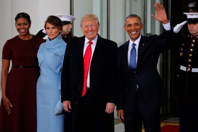 U.S. President Barack Obama (R) and first lady Michelle Obama (L) greet U.S. President-elect Donald Trump and his wife Melania for tea before the inauguration at the White House in Washington, U.S. January 20, 2017. REUTERS/Jonathan Ernst     TPX IMAGES OF THE DAY
