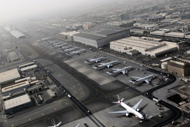 (FILES) This file photo taken on May 27, 2012 shows an aerial view of Dubai international airport. Dubai International cemented its title as the world's busiest airport for international passengers in 2016, with a 7.2 percent increase in travellers numbers to 83.6 million, its operator said on January 24, 2017. / AFP PHOTO / Karim Sahib