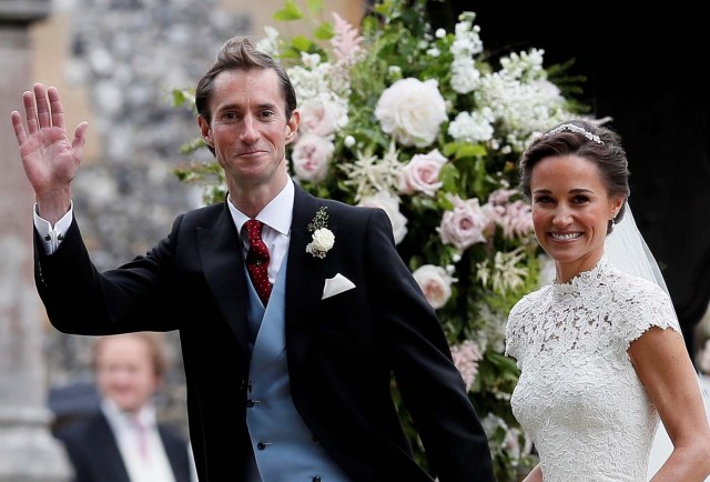 Pippa Middleton and her new husband James Matthews smile following their wedding ceremony at St Mark's Church in Englefield, west of London, on May 20, 2017.    REUTERS/Kirsty Wigglesworth/Pool