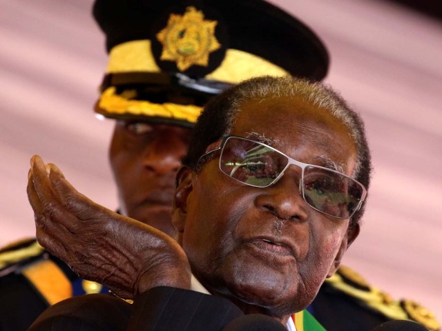 President Robert Mugabe speaks during Heroes Day commemorations in Harare, Zimbabwe, August 14, 2017. REUTERS/Philimon Bulawayo