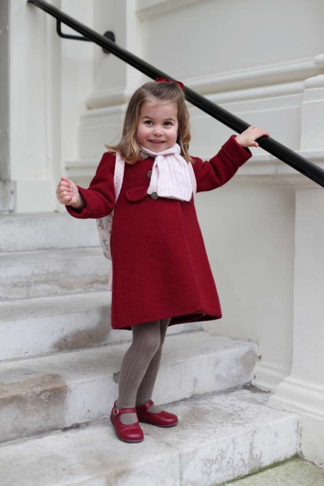 Britain's Princess Charlotte stands on the steps at Kensington Palace shortly before she left for her first day of nursery at the Willcocks Nursery School in a photograph taken taken by her mother and handed out by Britain's Prince William and Catherine, the Duchess of Cambridge in London, January 8, 2018. The Duchess of Cambridge handout via REUTERS Copyright: HRH The Duchess of Cambridge 2018. NEWS EDITORIAL USE ONLY. NO COMMERCIAL USE (including any use in merchandising, advertising or any other non-editorial use including, for example, calendars, books and supplements). This photograph is provided to you strictly on condition that you will make no charge for the supply, release or publication of it and that these conditions and restrictions will apply (and that you will pass these on) to any organisation to whom you supply it. All other requests for use should be directed to the Press Office at Kensington Palace in writing. NOTE TO EDITORS: This handout photo may only be used in for editorial reporting purposes for the contemporaneous illustration of events, things or the people in the image or facts mentioned in the caption. Reuse of the picture may require further permission from the copyright holder.