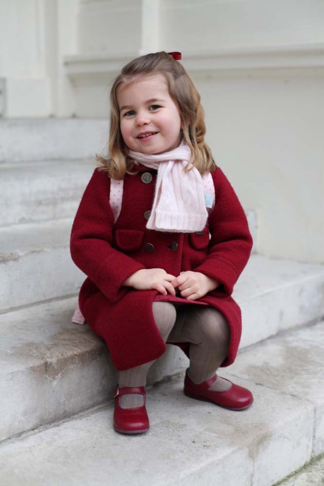 Britain's Princess Charlotte sits on the steps at Kensington Palace shortly before she left for her first day of nursery at the Willcocks Nursery School in a photograph taken taken by her mother and handed out by Britain's Prince William and Catherine, the Duchess of Cambridge in London, January 8, 2018. The Duchess of Cambridge handout via REUTERS Copyright: HRH The Duchess of Cambridge 2018. NEWS EDITORIAL USE ONLY. NO COMMERCIAL USE (including any use in merchandising, advertising or any other non-editorial use including, for example, calendars, books and supplements). This photograph is provided to you strictly on condition that you will make no charge for the supply, release or publication of it and that these conditions and restrictions will apply (and that you will pass these on) to any organisation to whom you supply it. All other requests for use should be directed to the Press Office at Kensington Palace in writing. NOTE TO EDITORS: This handout photo may only be used in for editorial reporting purposes for the contemporaneous illustration of events, things or the people in the image or facts mentioned in the caption. Reuse of the picture may require further permission from the copyright holder.