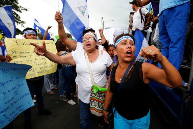 Demonstrators shout slogans during a protest march against Nicaraguan President Daniel Ortega's government in Managua, Nicaragua May 26, 2018. Picture taken May 26, 2018. REUTERS/Oswaldo Rivas