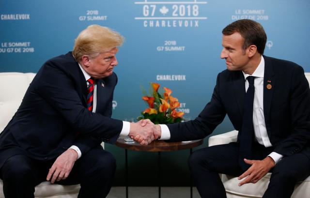 U.S. President Donald Trump shakes hands with France's President Emmanuel Macron during a bilateral meeting at the G7 Summit in in Charlevoix, Quebec, Canada, June 8, 2018. REUTERS/Leah Millis