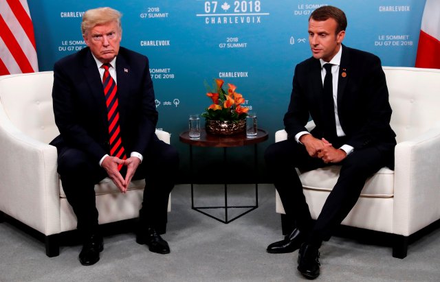 U.S. President Donald Trump and France's President Emmanuel Macron sit side by side during a bilateral meeting at the G7 Summit in in Charlevoix, Quebec, Canada, June 8, 2018. REUTERS/Leah Millis TPX IMAGES OF THE DAY