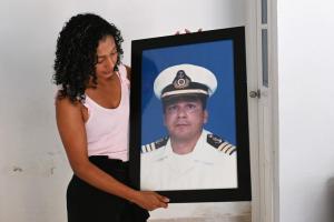 A shipmaster is buried in Colombia, but his widow can’t prove his death in Venezuela